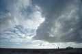 Cloud scenery with tourists wandering about