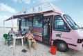 The "Pink Mama" or divebus offering drinks and some shadow at different divespots every day (south of Kralendijk)