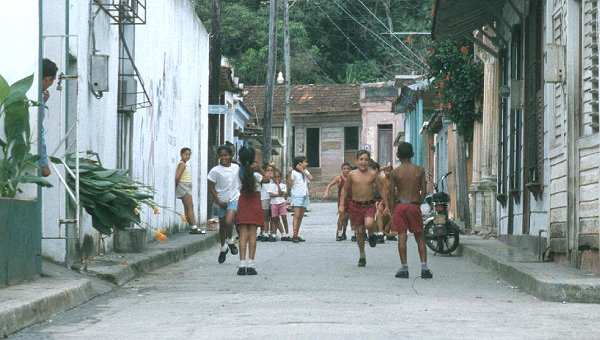 School kids playing in the street somewhere in Baracoa