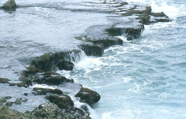 Rocky shore (looks volcanic) at Baracoa